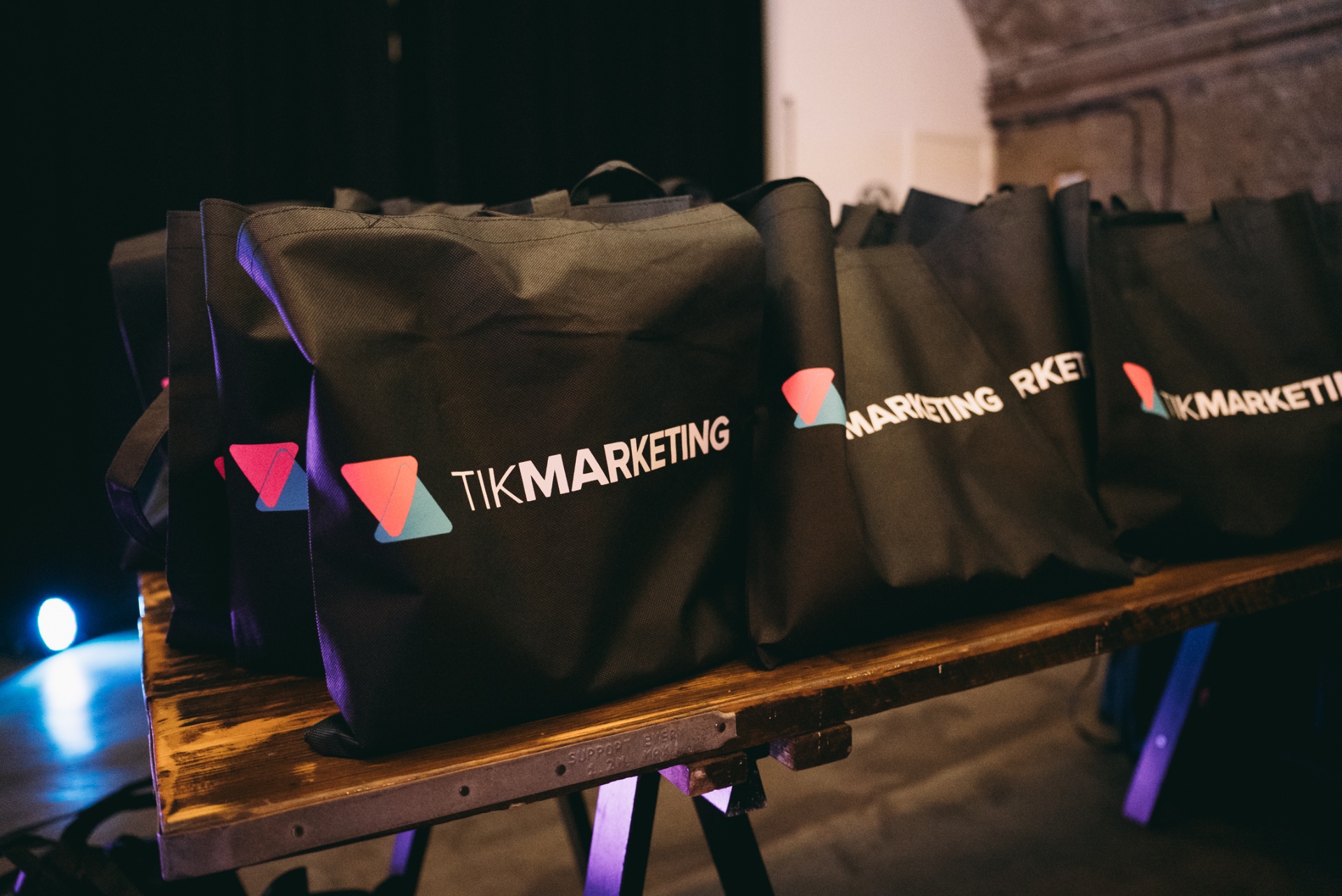 Branded TikMarketing tote bags at event